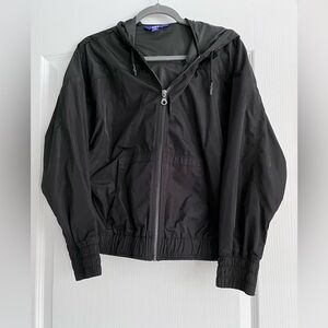 Medium windbreaker or rain jacket. Great condition except for my initials.